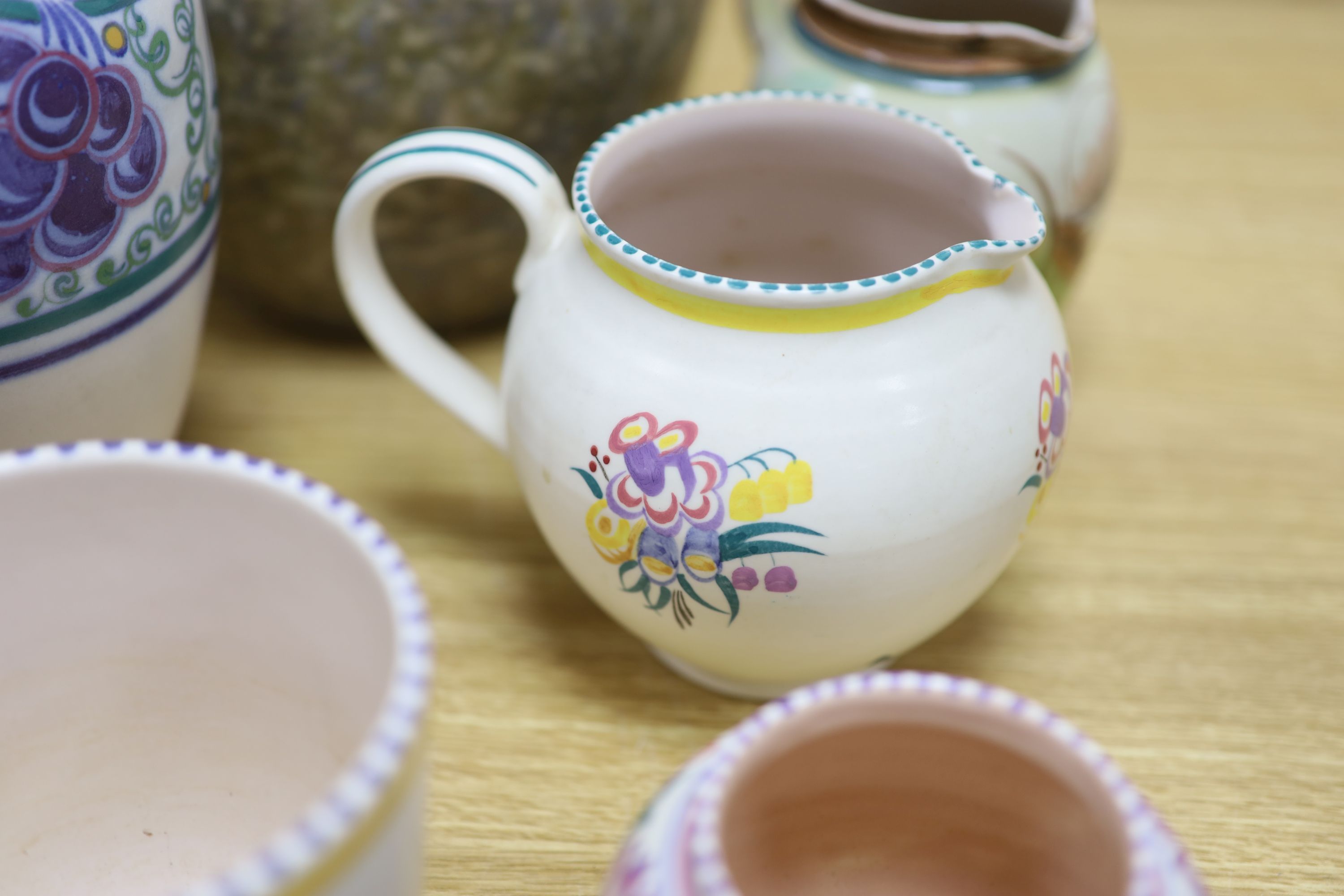 Eight pieces of Poole pottery, a Cranston vase and one other